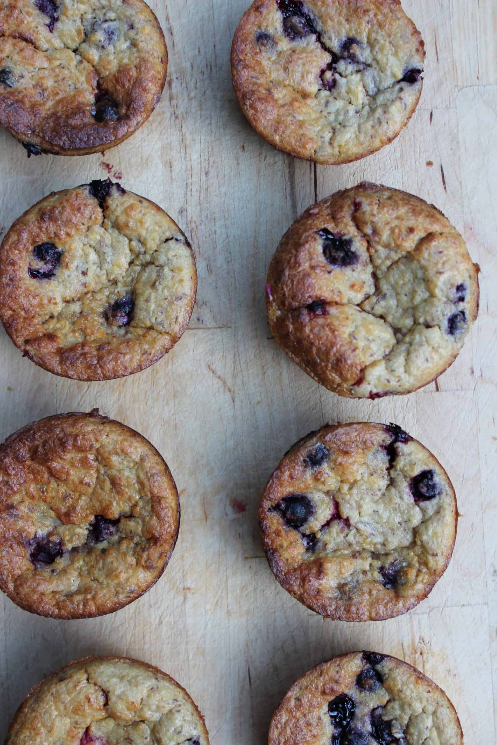 Blueberry Banana Oatmeal Muffins on a wooden cutting board