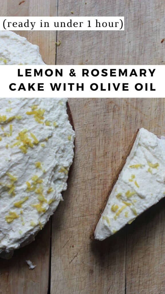 An overhead shot of lemon rosemary cake with olive oil and white frosting on a wooden cutting board.