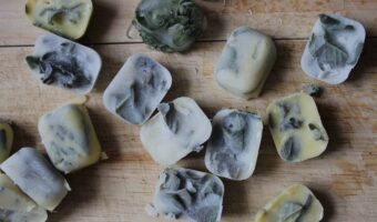 Sage frozen in ice cubes of water and butter.